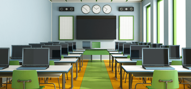 classroom with computers on each desk