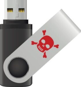 thumb drive with a skull and cross bones on it