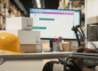 desktop workspace in a warehouse shipping environment