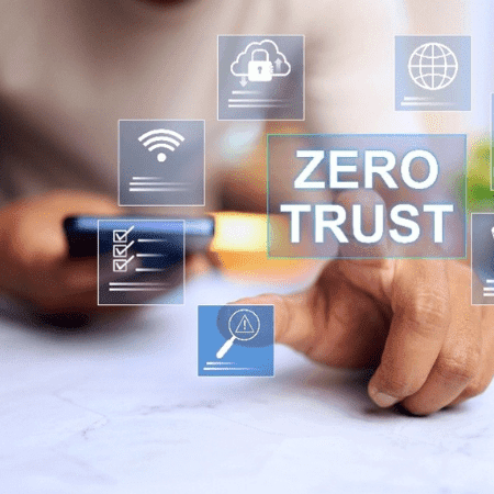 1st January TCI Blog – Zero Trust Network 2.0 What’s New and What You Should be Implementing – feature – feature .jpg image of a man sitting with zero trust written across the screen